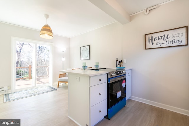 kitchen featuring light hardwood / wood-style flooring, electric range, white cabinets, decorative light fixtures, and beamed ceiling