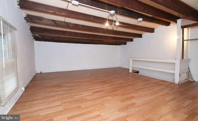 basement featuring light hardwood / wood-style flooring