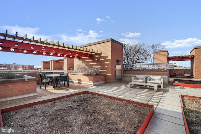 view of patio / terrace with outdoor lounge area and a pergola