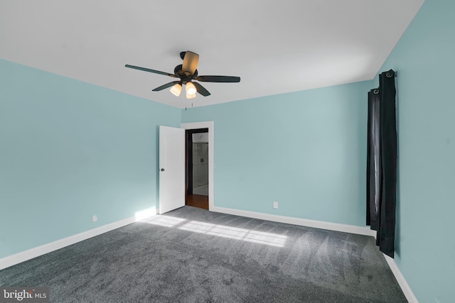 empty room with ceiling fan and carpet flooring