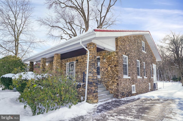 view of snow covered property