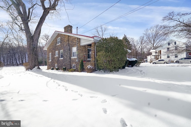 view of snow covered property