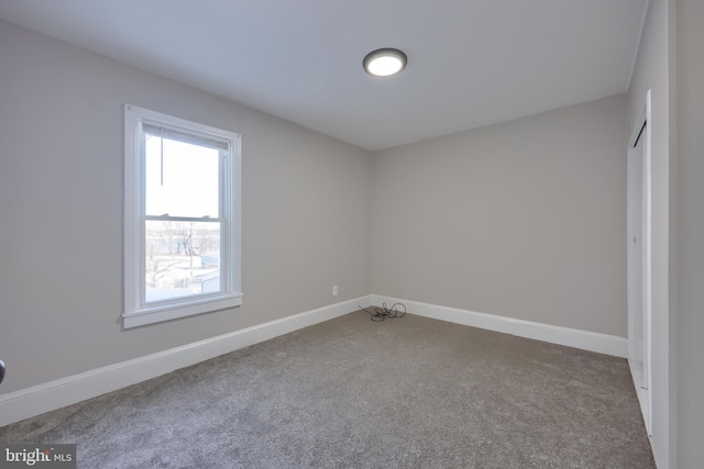 view of carpeted spare room