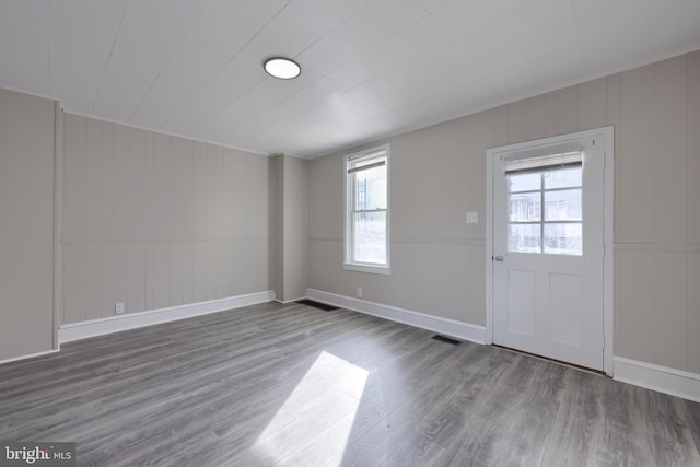 entryway with wood-type flooring