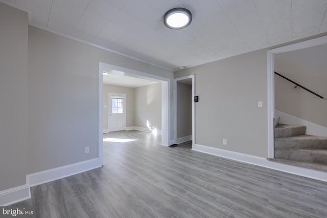 spare room featuring hardwood / wood-style floors