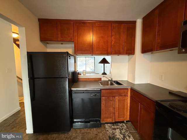 kitchen featuring sink and black appliances