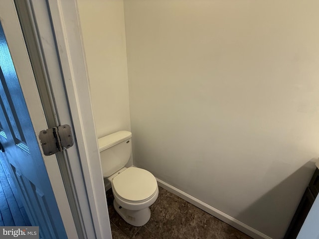 bathroom featuring toilet