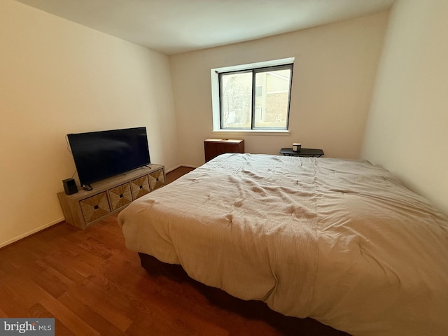 bedroom featuring hardwood / wood-style flooring