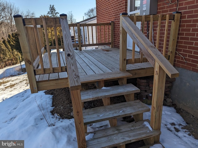 view of snow covered deck