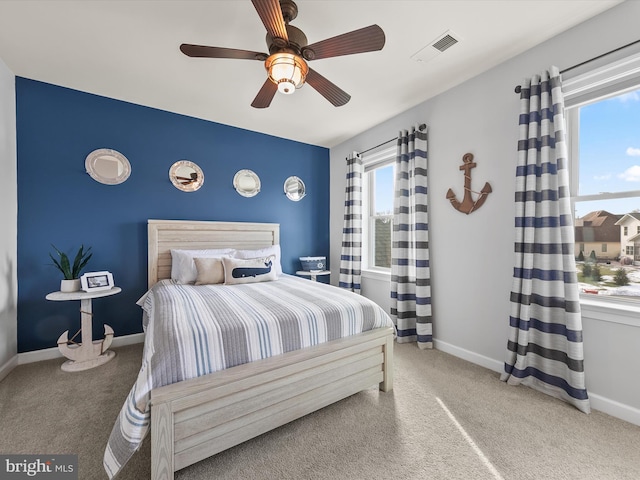 bedroom featuring ceiling fan