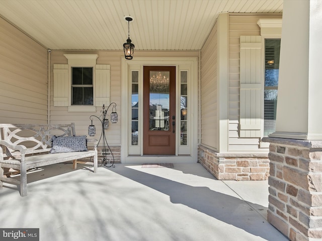 entrance to property with covered porch