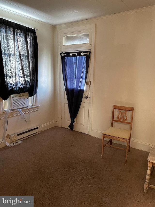 foyer entrance with crown molding, carpet flooring, cooling unit, and a baseboard radiator