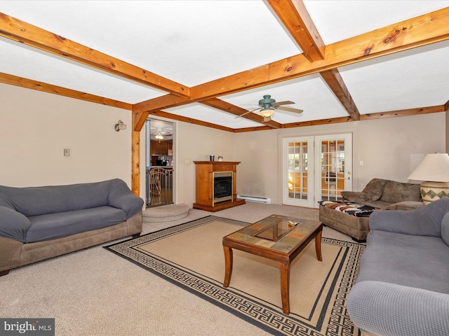 carpeted living area with french doors, a baseboard heating unit, a glass covered fireplace, ceiling fan, and beamed ceiling