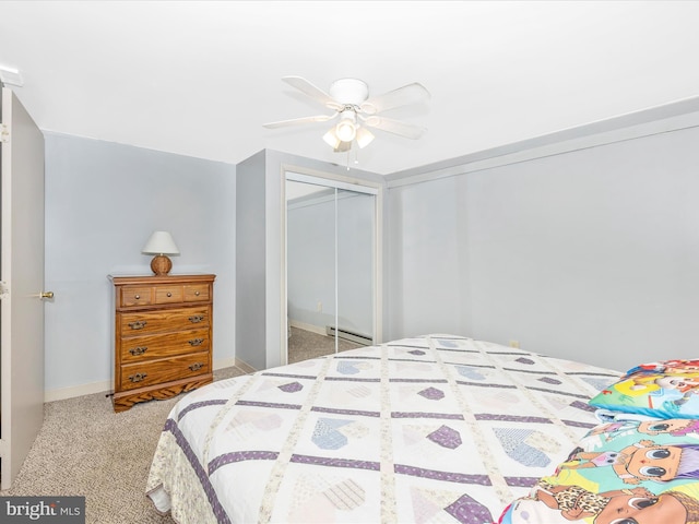 bedroom with a baseboard radiator, baseboards, ceiling fan, and carpet