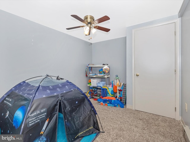 bedroom with carpet floors and a ceiling fan