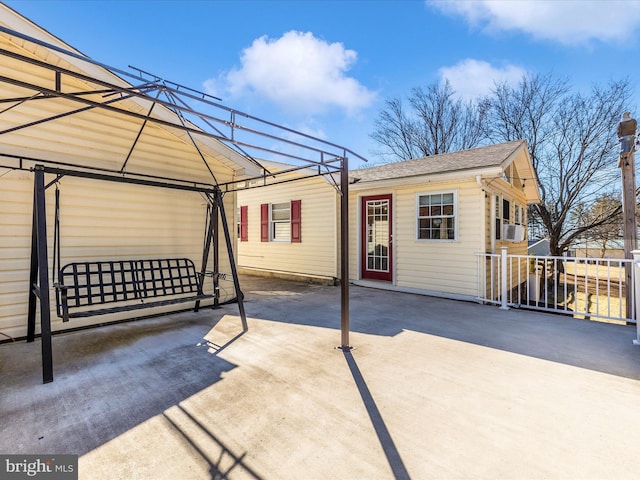 view of patio / terrace featuring driveway and a gazebo