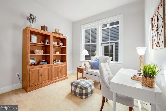 sitting room with light colored carpet