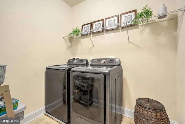 laundry room featuring separate washer and dryer