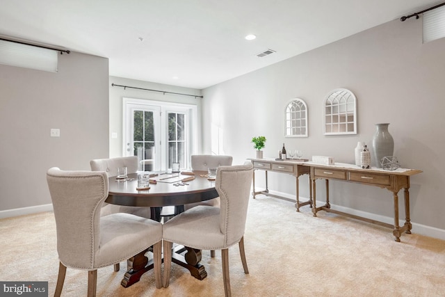 view of carpeted dining room