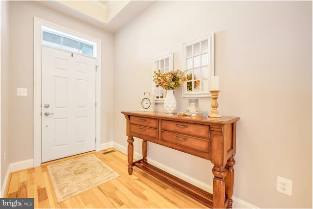 foyer with light hardwood / wood-style floors