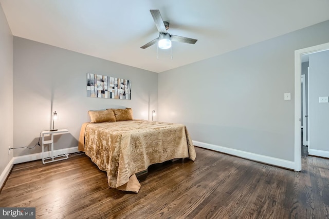 bedroom featuring dark wood-type flooring and ceiling fan