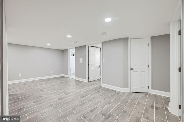 basement featuring light hardwood / wood-style flooring