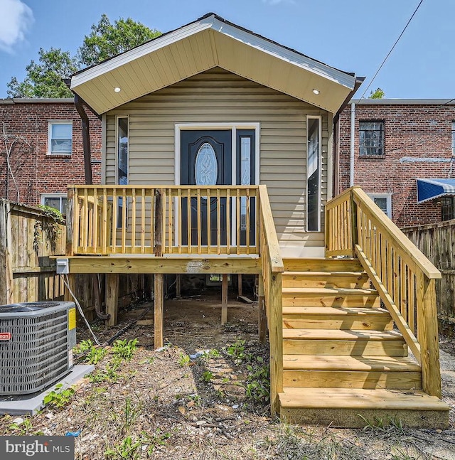 back of property with central air condition unit