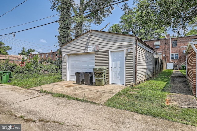 garage featuring a yard