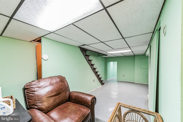 unfurnished room featuring a paneled ceiling