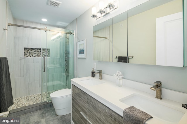700 Moyer St Unit 103, Philadelphia, PA 19125 - bathroom featuring vanity, a shower with shower door, and toilet