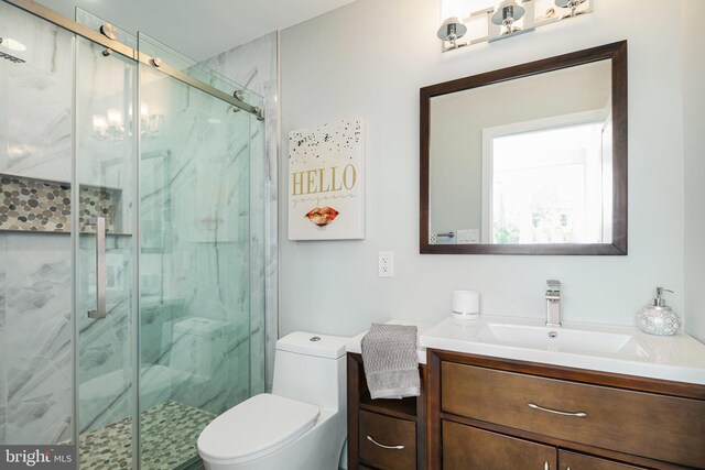 700 Moyer St Unit 103, Philadelphia, PA 19125 - bathroom featuring vanity, toilet, and walk in shower