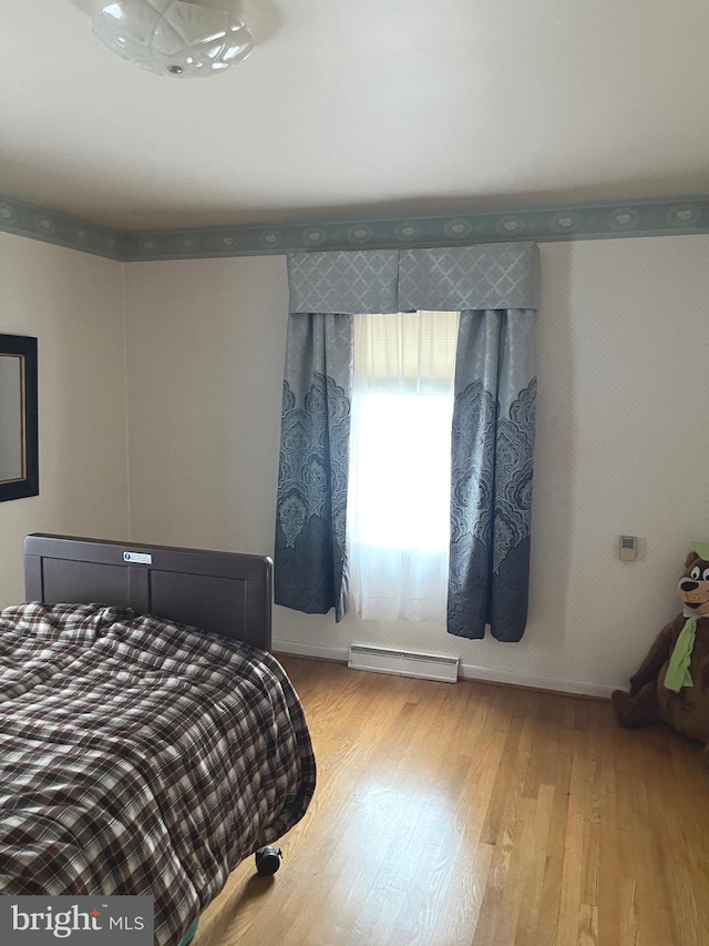 bedroom featuring light hardwood / wood-style flooring