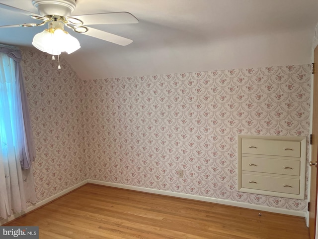 unfurnished room with ceiling fan and light hardwood / wood-style flooring