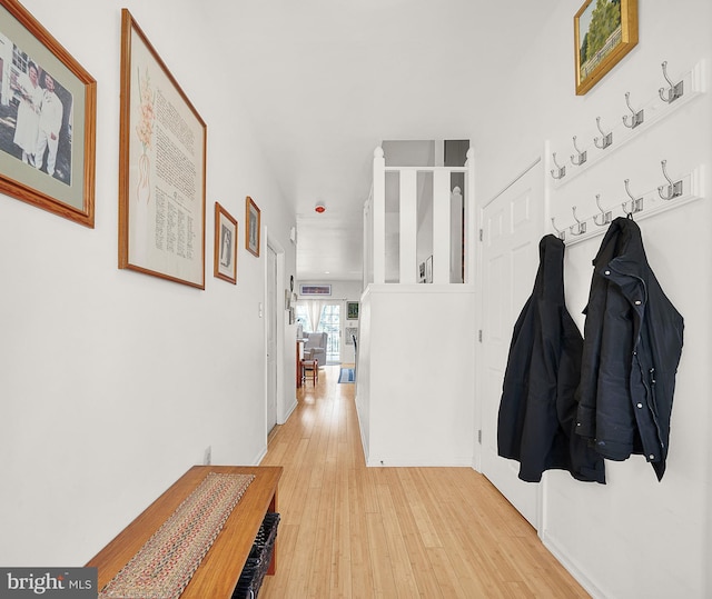 hall with light wood-type flooring