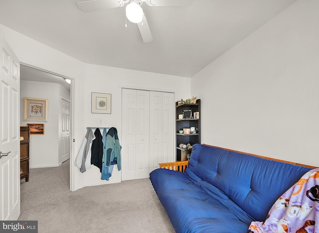 interior space with ceiling fan