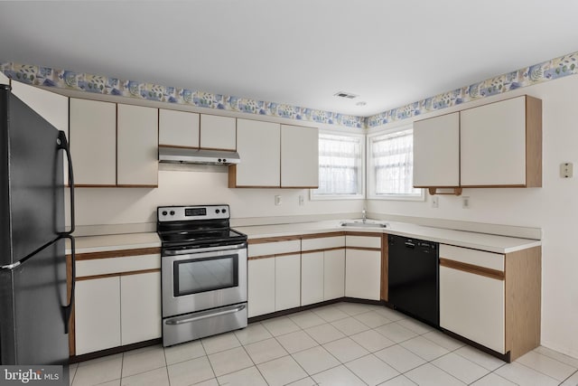 kitchen with white cabinets, sink, and black appliances