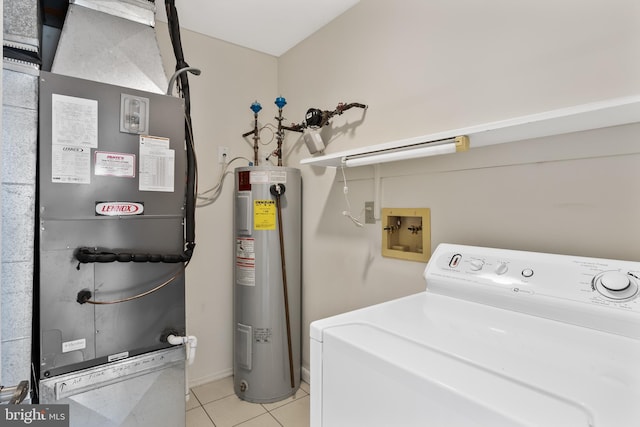 washroom with washer / clothes dryer, heating unit, light tile patterned floors, and water heater