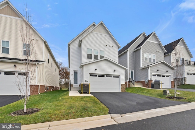 view of front of home featuring central AC unit, a garage, and a front yard