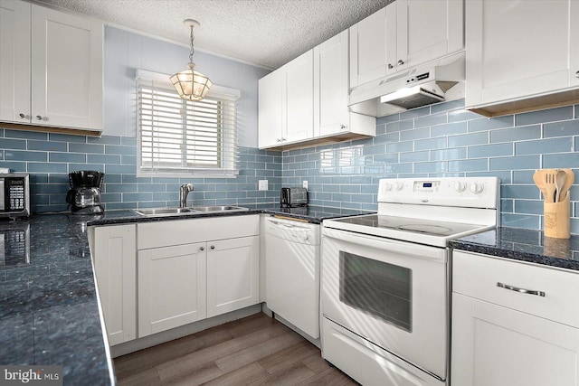 kitchen featuring sink, white appliances, white cabinetry, wood-type flooring, and a textured ceiling