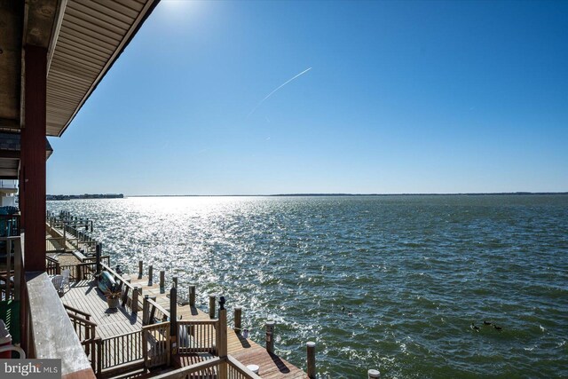 property view of water featuring a dock