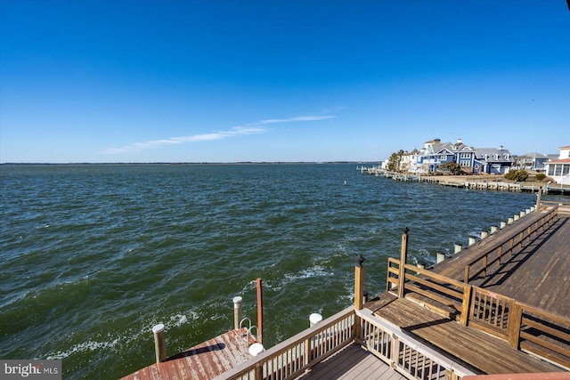 property view of water with a boat dock