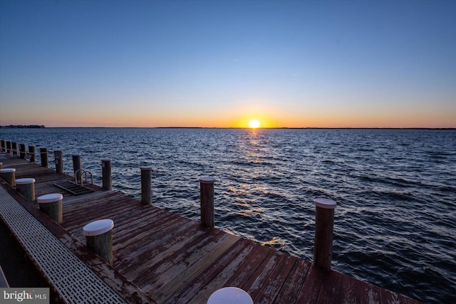 view of dock with a water view