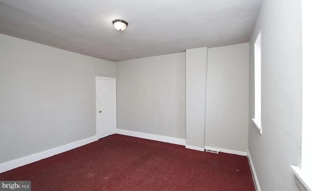 view of carpeted spare room