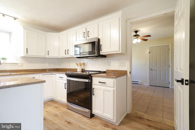 kitchen featuring ceiling fan, white cabinetry, backsplash, stainless steel appliances, and light stone countertops