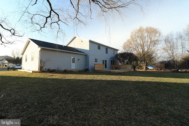 view of property exterior featuring a lawn