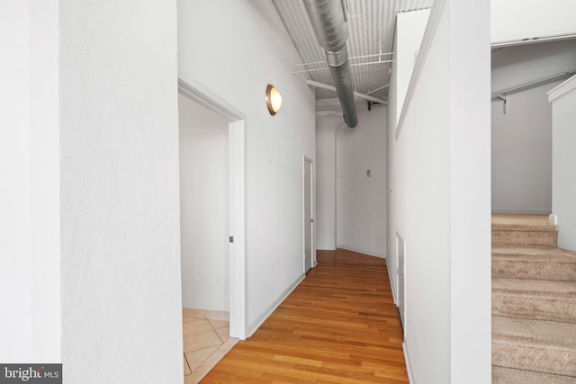 corridor featuring light wood-type flooring