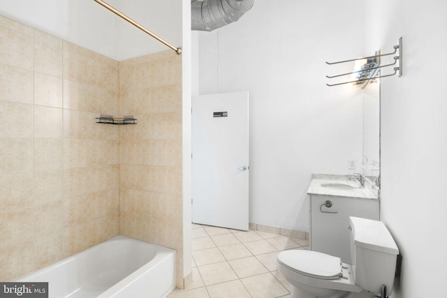 full bathroom with tile patterned flooring, vanity, toilet, and tiled shower / bath