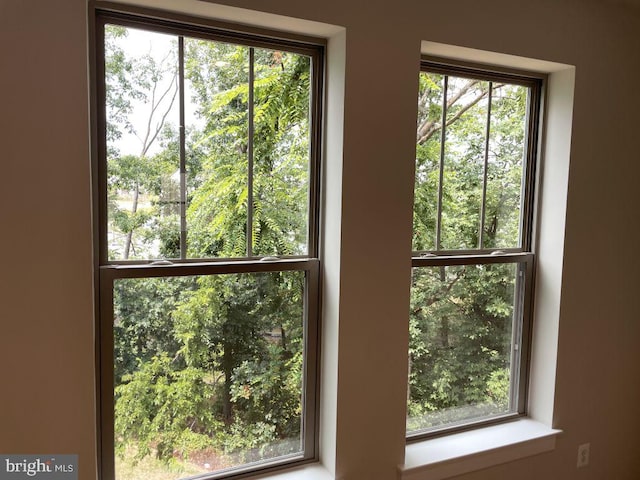 doorway to outside featuring a wealth of natural light