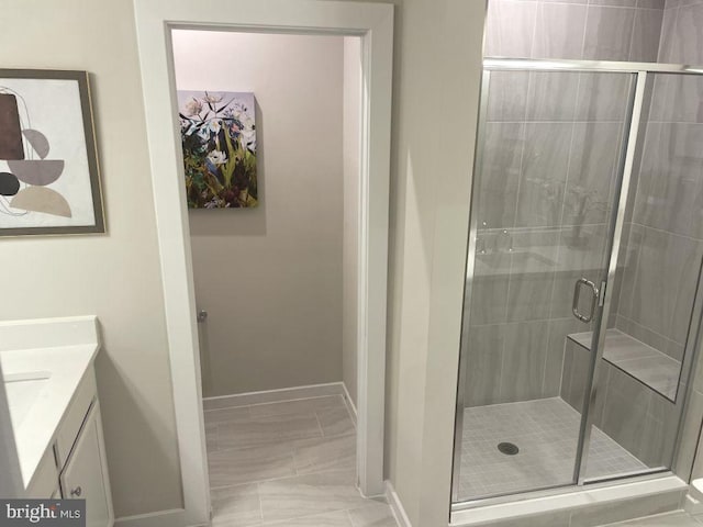 bathroom featuring vanity and walk in shower