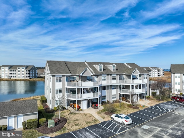 view of building exterior with a water view